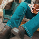 Close-up of feet wearing the Westech Outrider Barrel Brown slip-on shoe on the porch, highlighting the supportive fit and Western styling for everyday adventures