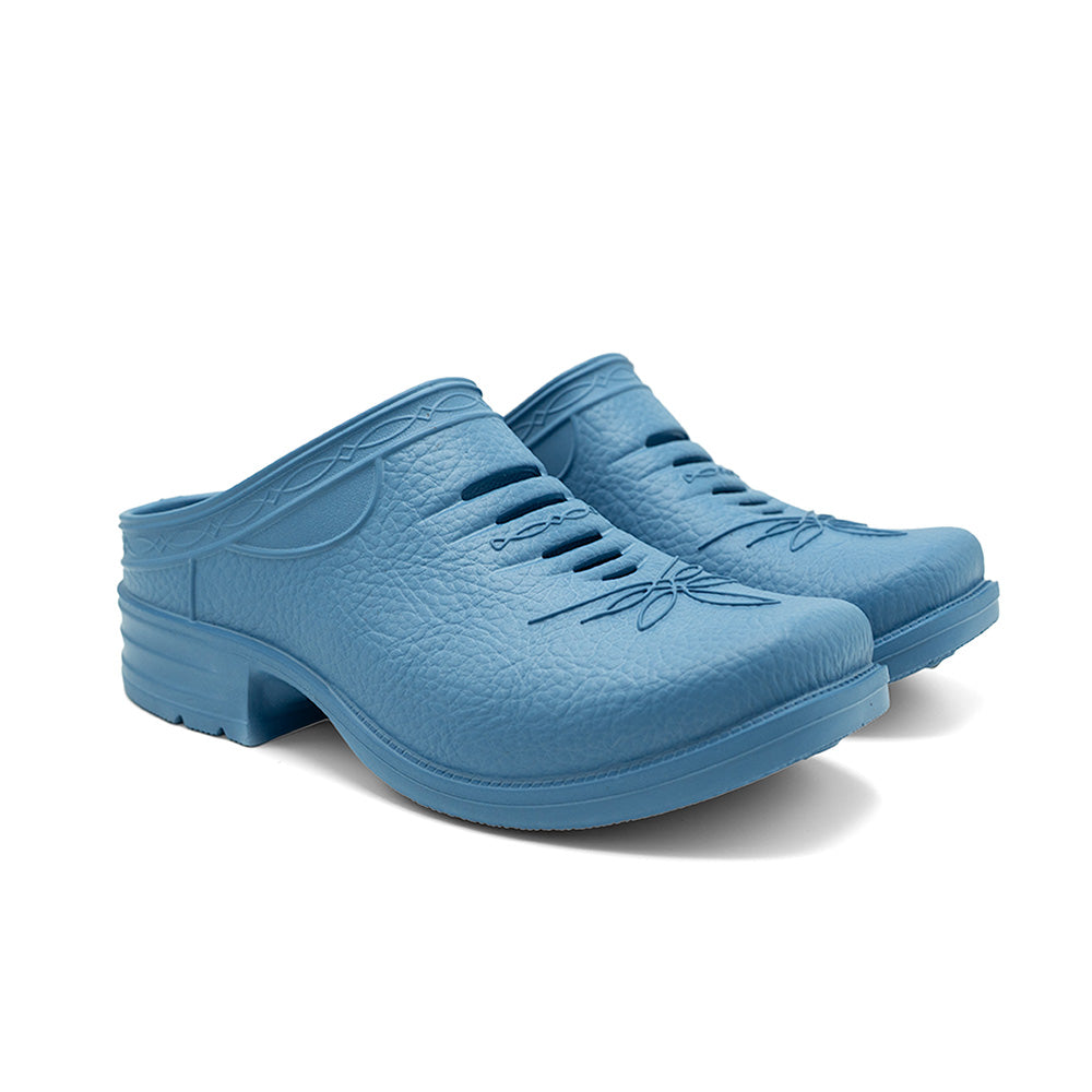 Pair of Westech Outrider slip-on shoes in Robin's Egg Blue on white background, lightweight EVA Western shoes with supportive arch, Made in USA