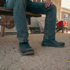 Relaxed shot of someone wearing the Westech Outrider Raven Black slip-ons, ultra-comfy EVA shoes designed for all-day Western lifestyle